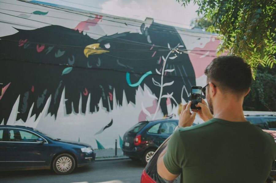 Bucharest Alternative Walking Tour - The Restored Square Cat Mural at Cinema Capitol