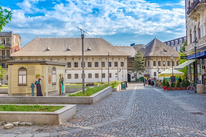 Bucharest one day tour with Parliament Palace and Village Museum - The Athenaeum, Cantacuzino Palace, and the royal center
