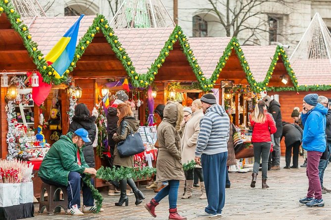 Bucharest: Tour of Christmas traditions & decorations - University’s Square and a Romanian Christmas drink