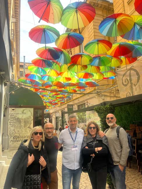 Bucharest: Walking tour with Italian speaking guide for small groups - Starting at Caru’ cu Bere in Old Town