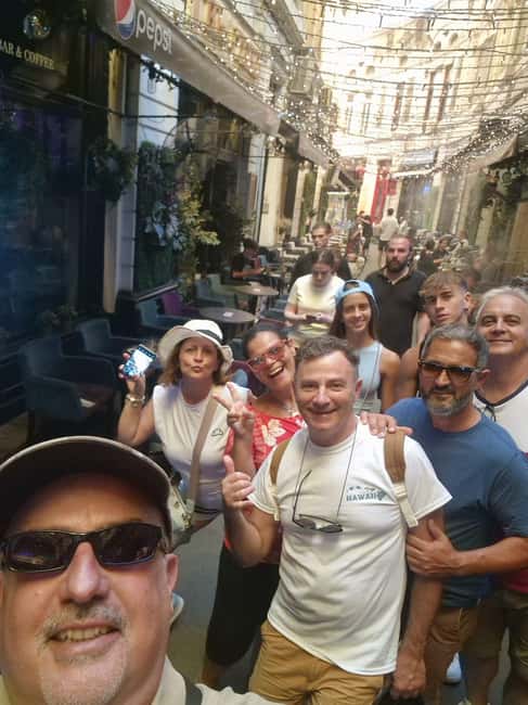 Bucharest: Walking tour with Italian speaking guide for small groups - Stavropoleos Monastery and Manuc’s Inn