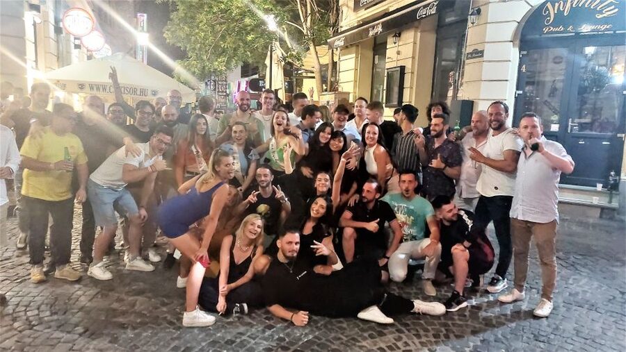 Bucharest: Weekend Pub Crawl - Bucharest after dark, with a moving party