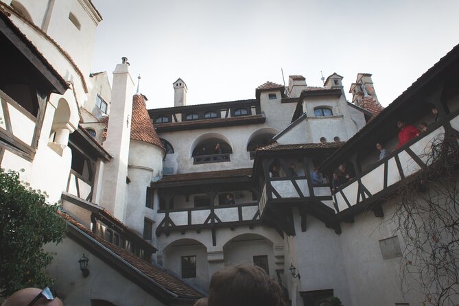 Legends&Wildlife Awaits: Dracula's Castle & Bear Sanctuary - Bran Castle mixes stone walls with Dracula legend