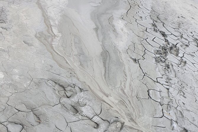 Muddy Volcanoes and Salt Mine Private Full-Day Tour from Bucharest - Berca Mud Volcanoes: bubbling clay in the open air