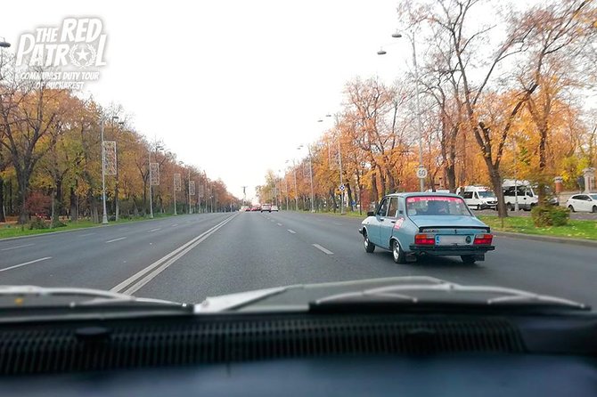 Private - Romanian Vintage Car Driving Tour of Bucharest 120 min - Constitution Square faces the Palace of Parliament