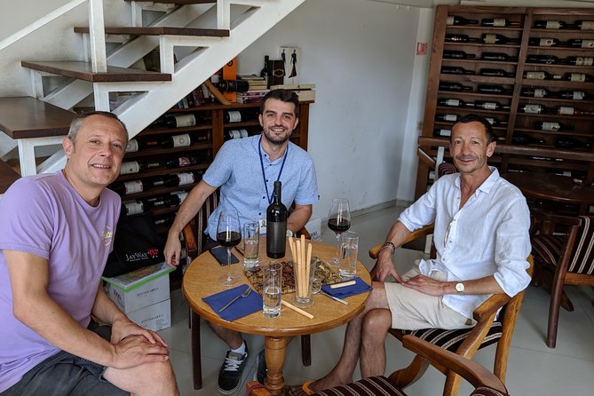 Traditions in Bucharest: Village Museum and Wine Tasting Tour - Romanian wine on Calea Victoriei